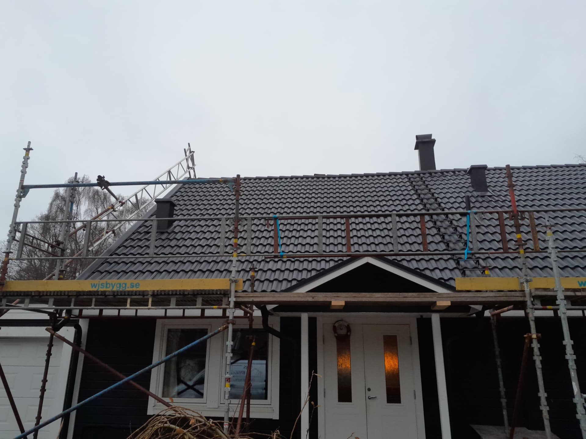 Takbyte med byggställning — Takbyten