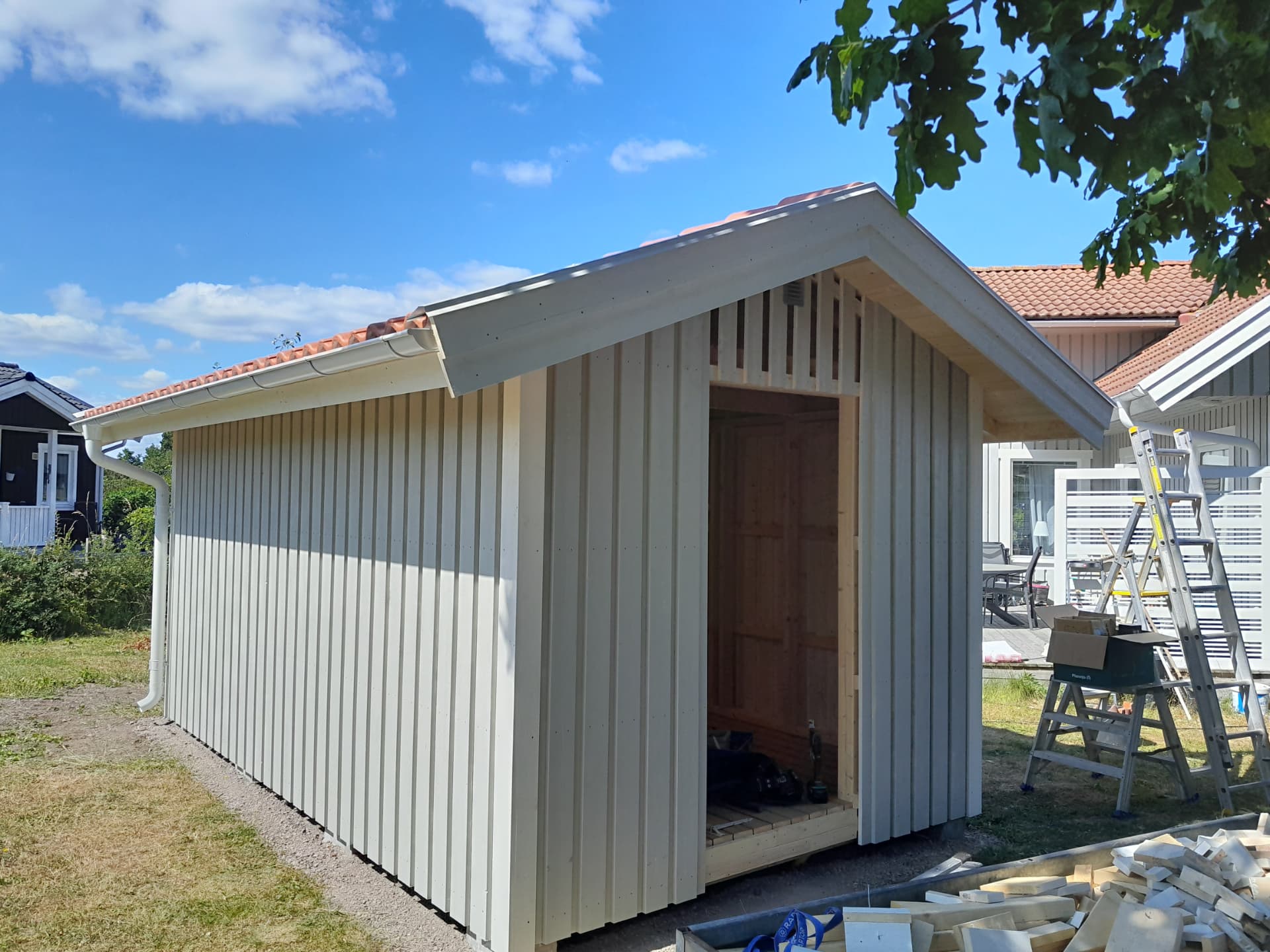 Förråd under byggnation — Tillbyggnad